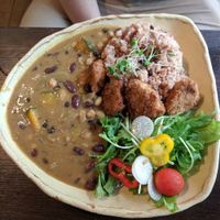 Japanese bean curry served with brown rice, salad and vegan cutlets at Ramuna in Nara