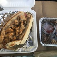 😋 Oyster mushroom po’boy and home fries  at Irregardless Cafe in Raleigh