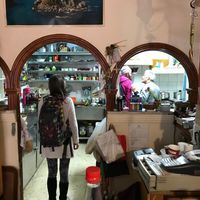 Menu checking in the kitchen, meet your cook. at Angelas Taverna in Corfu