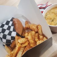 Brunch burger with fries and a side of cheesy grits at V-Grits and Chimera Brewing in Louisville
