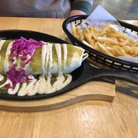 Wrap filled with fajita-style seitan and covered with salsa verde at V-Grits and Chimera Brewing in Louisville