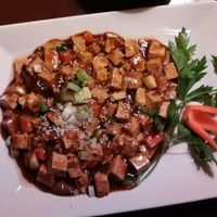 "Meatballs" on top, served with fresh vegetables.
Tofu with a mushrooms sauce on the bottom at Kokyo in Stockholm