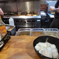 Sit at the bar and watch the grill at Roasted in Bethlehem