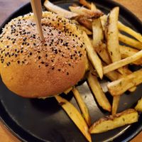 Burger and fries at Apuro Vegan Bar in Porto
