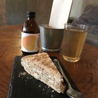 Bolo do bolacha and ginger kombucha  at Apuro Vegan Bar in Porto