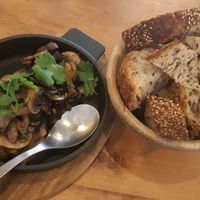 Mushrooms au vin with bread at Apuro Vegan Bar in Porto