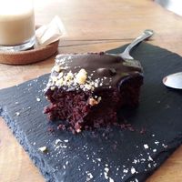 Really good brownie (served a little headed 🤤). And the waiter was super friendly. High recommendation! They also have a good amount of burgers/bowls and snacks. at Apuro Vegan Bar in Porto