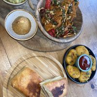 Drumstick, sandwich snack, no chicken nuggets and guac/salsa with corn and beetroot chips.  at Apuro Vegan Bar in Porto