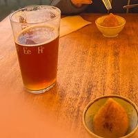 Drumstick and beer  at Apuro Vegan Bar in Porto