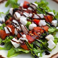 Grilled watermelon salad with feta cheese at Apuro Vegan Bar in Porto