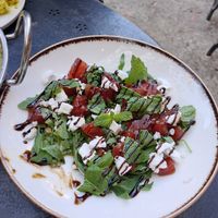 Grilled water melon with 'feta', mint and balsamic cream at Apuro Vegan Bar in Porto