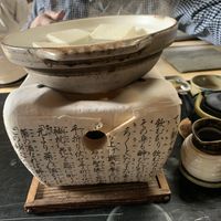 Bubbling tofu pot on a flame at your table  at Tofu Manjyu Okutan Kiyomizu in Kyoto