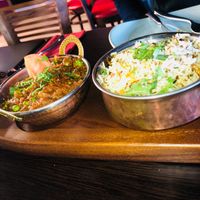 We went back again! This time we ordered off the menu and the chef made some special dishes for us too!

Garlic rice. And a wonderful aubergine dish at Popadom in Chatham