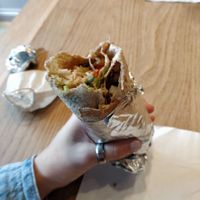 My burrito: medium tofu on wholemeal wrap, brown rice, onions and peppers, black beans and pinto beans, marinaded tofu, spicy salsa, tomato and cucumber & lettuce 🌯 at Paparrito's in Cheltenham