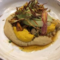 Smoked tofu entree with veggie purée, carrot ribbons and lentil pasta. at L'Orygine in Quebec