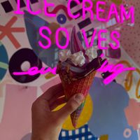 very colorful flavors, plus vegan toppings (whipped cream, peanut butter bark, and cookie dough) at MN Nice Cream in Minneapolis