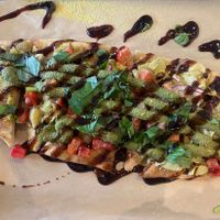 Pesto Artichoke Flatbread  at Revelations Cafe in Lutz