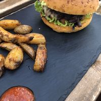 Black bean burger with vegan cheese:P at Laundry Lounge in Sagres