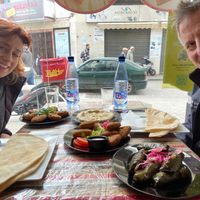 Enjoying an assortment of delicious vegan-friendly Syrian dishes. at Abou Tayssir in Tangier