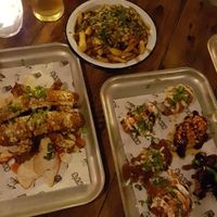 Corn ribs, poutine, assortment of wings at Biff's x Brewdog - Dalston in North London
