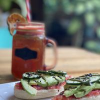 Tosta de aguacate / tomate y zumo at Gypsea in Puerto Viejo De Talamanca