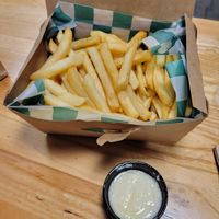 the fries look a lot better than they were. Mealy, greasy,dry. Garlic sauce is toume that they've sucked the life out of.  Flavorless, mostly oil. at MSP - Holy Land - T1 in Minneapolis