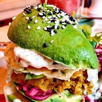 Palta burguer con guarniciones a escoger  at Prana Vegan in Arequipa