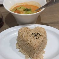 Yellow vegetable curry with brown rice at Plumeria in Encinitas