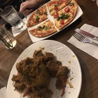 Mofongo and vegan margherita pizza  at Cafe Berlin in San Juan
