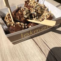 Lokma with chocolate sauce and hazelnuts at Lokmata - Kadıköy in Istanbul