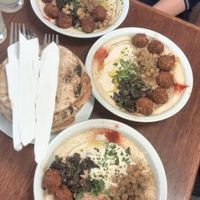 Complete hummus plates at Hummus Bar Vegetarian in Budapest