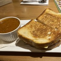 Vegan beet Reuben sandwich with (tomato kale) soup of the day  at Snakes & Lattes - Bloor St in Toronto