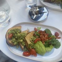 Pesto (I believe), avocado, tomato, and bacon with toastt  at Avit in Athens