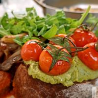 Avit Breakfast : Fluffy toasted brioche, sausage in tomato sauce, mushrooms, avocado, cherry tomatoes, hash brown at Avit in Athens
