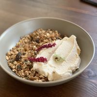 Homemade granola with dried fruit and homemade cashew yogurt... creamy, not to sweet... Delicious combination of textures!  at Avit in Athens