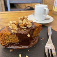 Carrot cake with hot chocolate and a very smooth coffee at Las Vegan in Lisbon