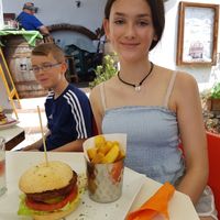 My daughter with her vegeburger at Gusto in Frigiliana