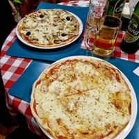 Cheese pizza and vegetarian pizza at Uno Restaurant in Krabi