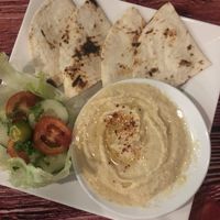 Hummus with hot pita bread. Delicious.  at Persian Palate - Mango Square in Cebu