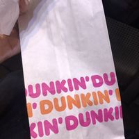 donuts served on parchment paper and placed in a recyclable paper bag instead of a plastic bag at Dunkin' Donuts - Far East Plaza in Central Singapore