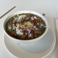 Spirulina smoothie bowl (love at first bite)  at Daily Poison in Vilnius