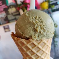 Pistachio gelato with vegan waffle cone🤤 at Made In Rome Organic Gelato in Siesta Key
