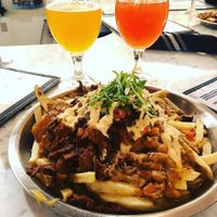 Fries and brew  at Modern Times Far West Lounge in Encinitas