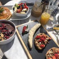 Breakfast choice (Boost + açaí bowl) at Galini Cafe in Santorini