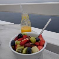 Fruit bowl and freshly squeezed orange juice at Galini Cafe in Santorini