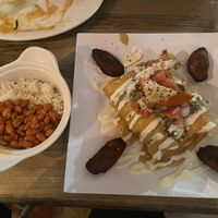 Taquitos with a side of rice and beans  at Arles and Boggs  in Wallingford