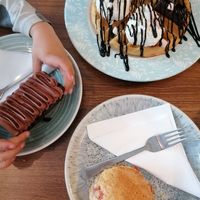 Chocolate cake, chocolate waffles and a scone with butter and jam at The Greenhouse in Horsforth