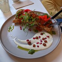 Savoury Waffle with edible flowers! at Sacred Grounds in Exeter