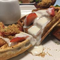 Sweet waffles August 19 - roasted peaches, macerated strawberries, creme anglaise at Sacred Grounds in Exeter