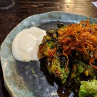 (eggfree) okonomiyaki with vegan sauce. You can custom choose one vegetable to add to the okonomiyaki (options on backside of menu), we chose avocado at Yasai Izakaya Genki in Tokyo